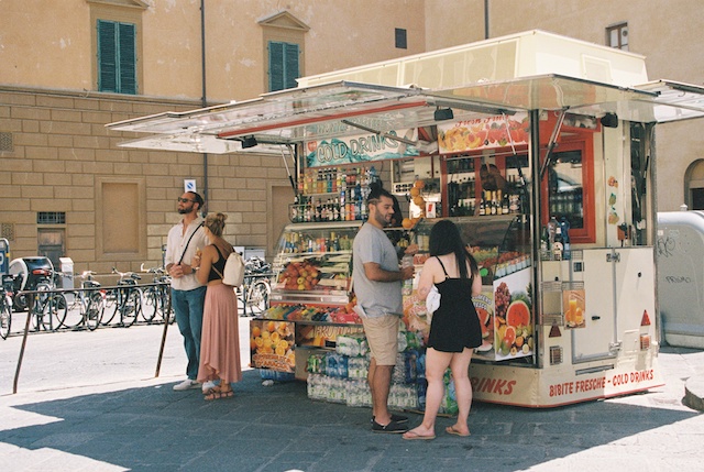 image of a kiosk with people around