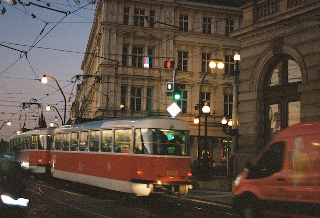 image of a moving tram at night